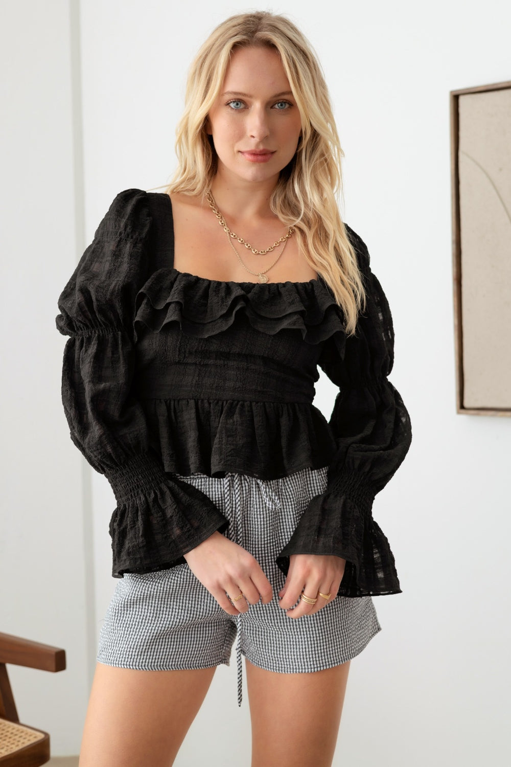 Black Shirred Smocked Peplum Long Sleeve Top